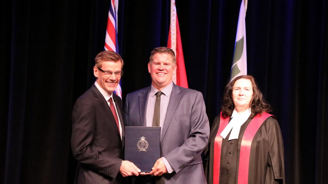 Constable Mike Grandia pictured with Chief Lipinski and the Honourable Judge Kimberley Arthur-Leung