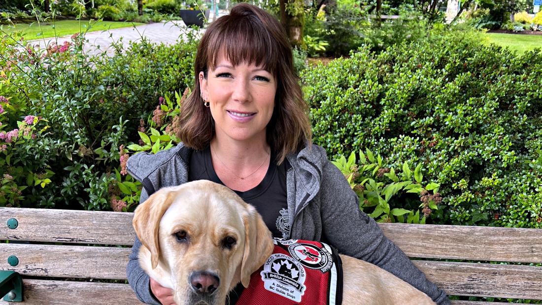 Kaleigh and Ragnar SPS's OSI dog sitting on bench